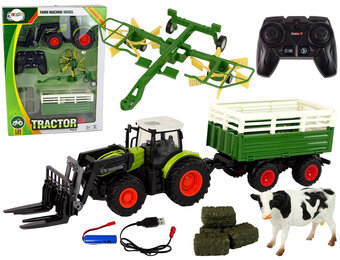 Bestuurbare trekker - RC - met hooi en koe beeldje - groen