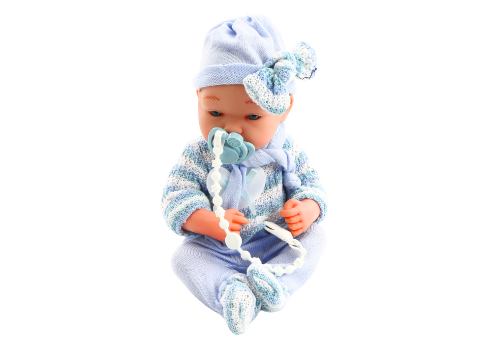 Baby pop - blauwe kleding - beweegbaar - 36cm x 17cm x 9cm