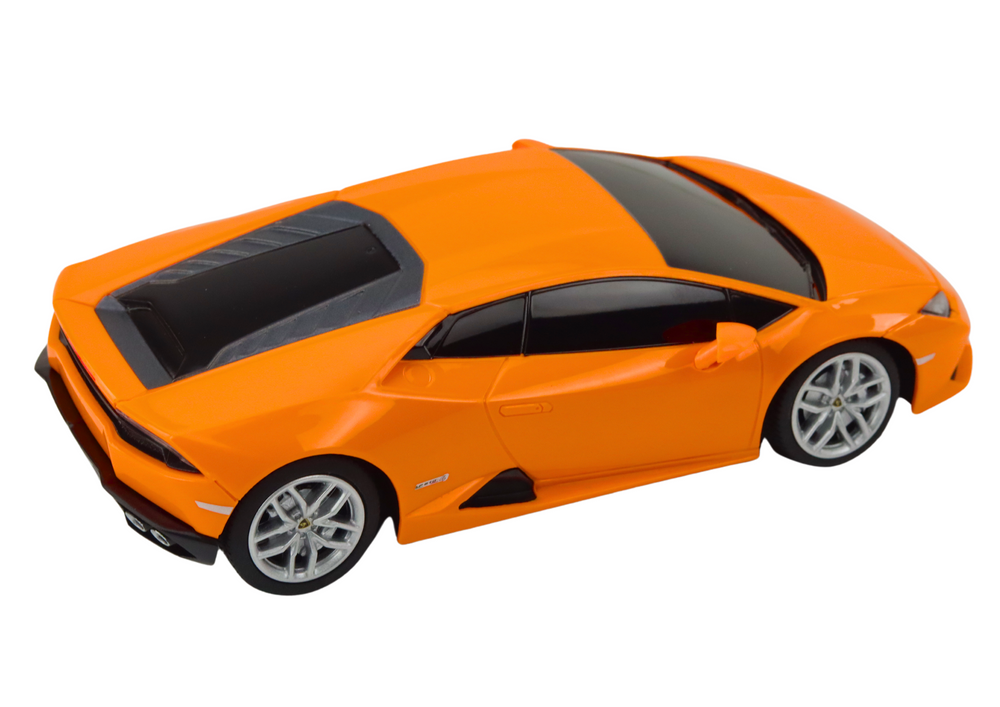 Bestuurbare auto - oranje - rubberen wielen - 19x8x5 cm