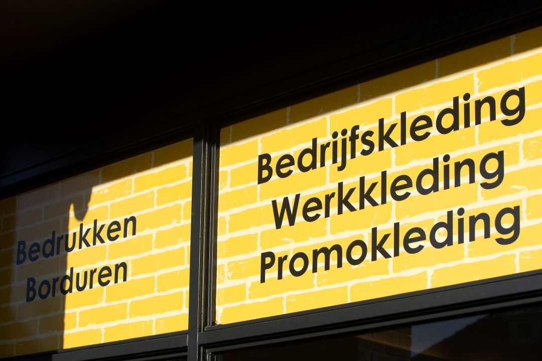 Bedrijfskleding met logo; een slimme investering