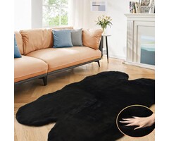 Organischer Teppich 120 x 180 cm Schwarz - Flauschig & bis zu 40% reduziert