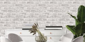 Kan ik over oud behang heen behangen?