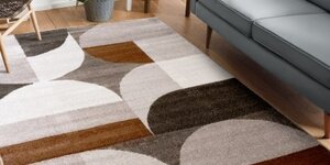 Welk vloerkleed past in de woonkamer? Complete keuzehulp voor formaat, kleur en stijl