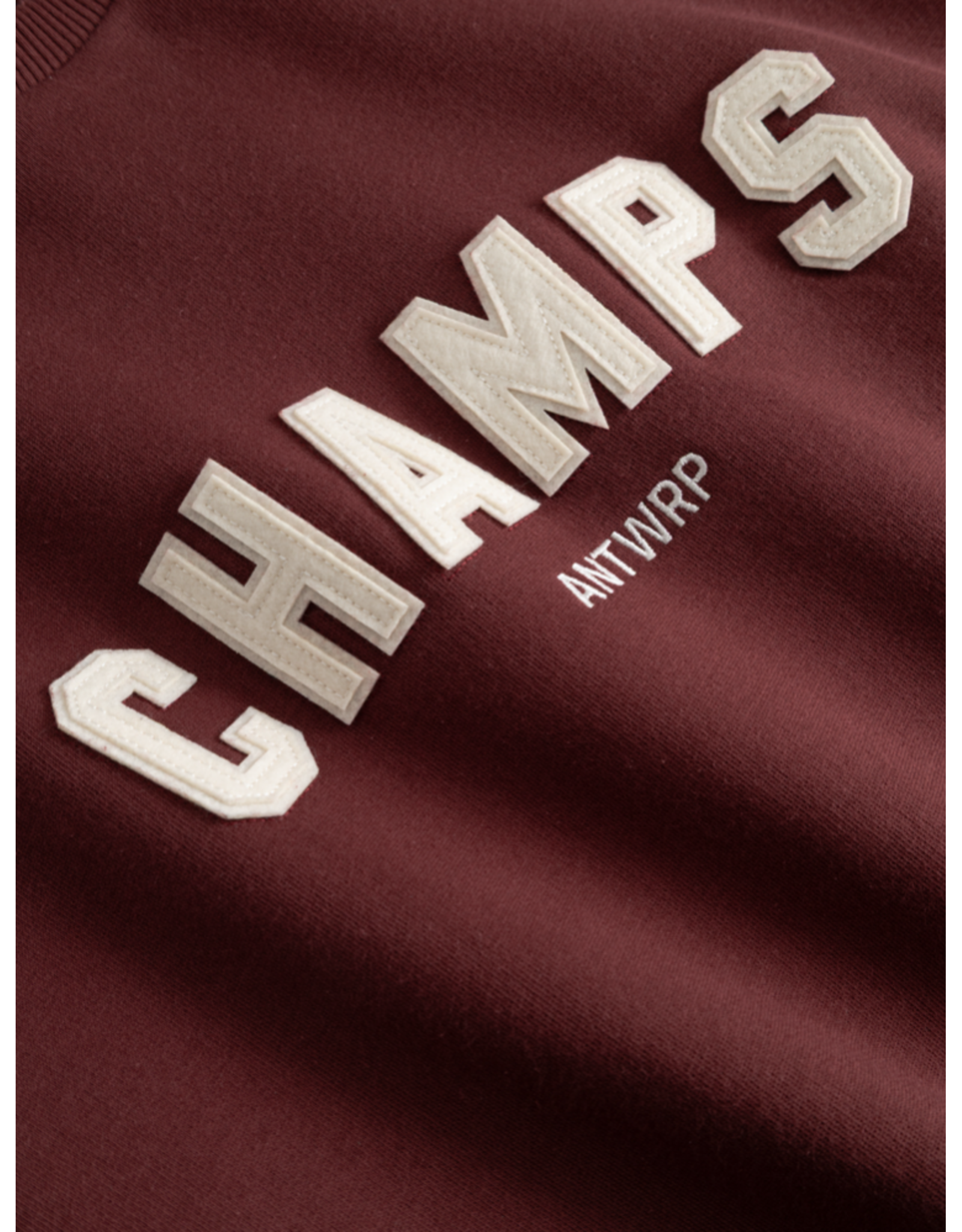 ANTWRP sweater champs crimson red