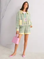 Jas met contrasterende details