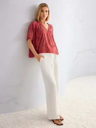 Zwierige blouse met versiering