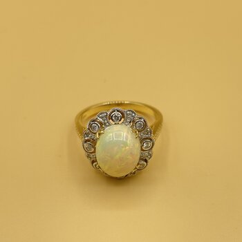 Opal  .25ct diamond