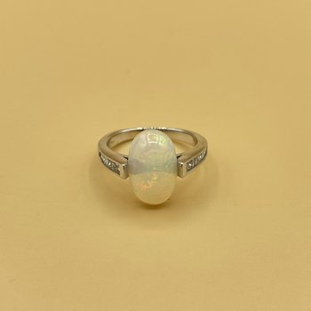 Opal  .50ct diamond