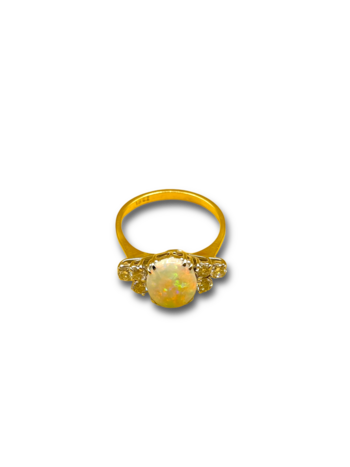 Opal en  .60ct diamond