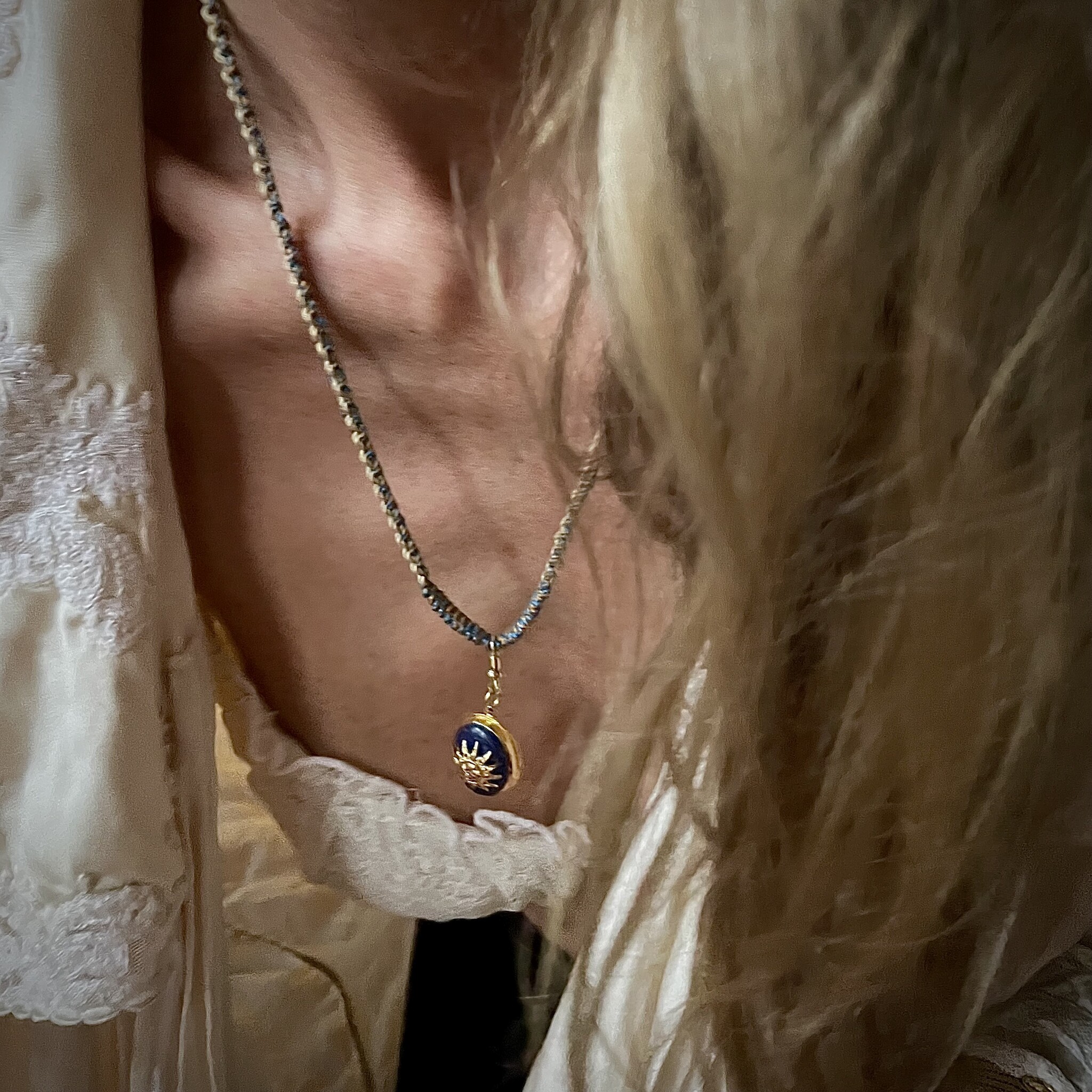 Gevlochten ketting musqueton