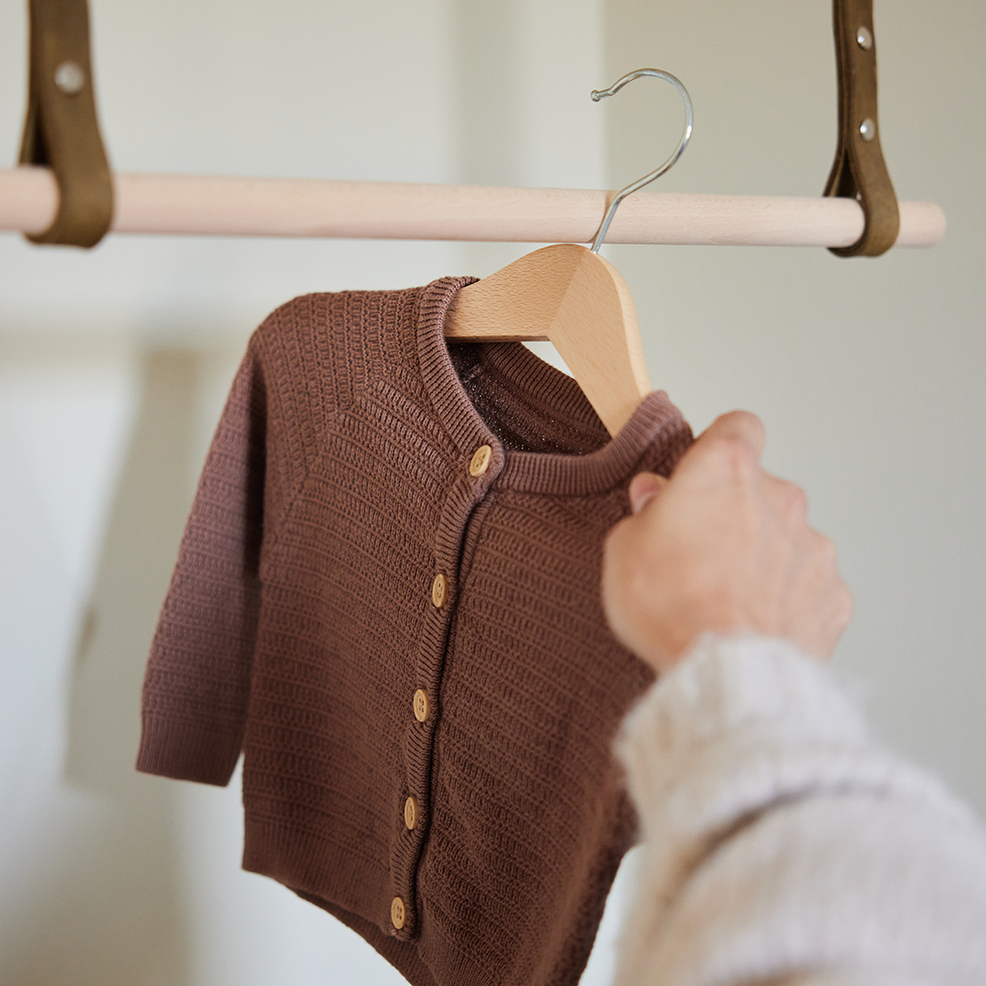 Babykleding ophangen