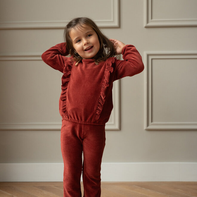 Dirkje Mädchen-Set: roter Pullover und ausgestellte Hose mit Rüschen