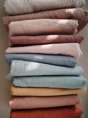 Mushie swaddle tradewinds