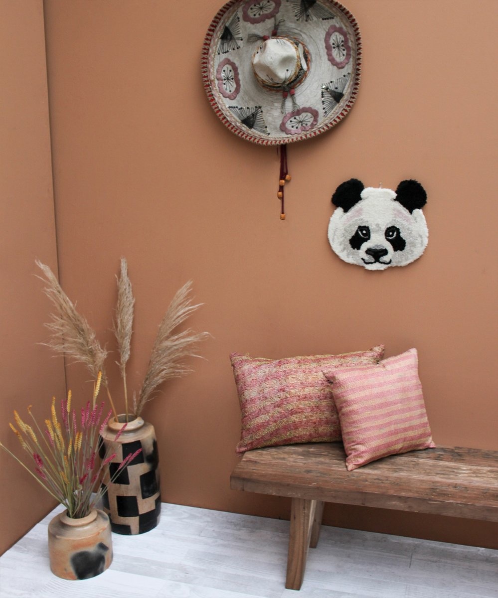 Plumpy panda head rug