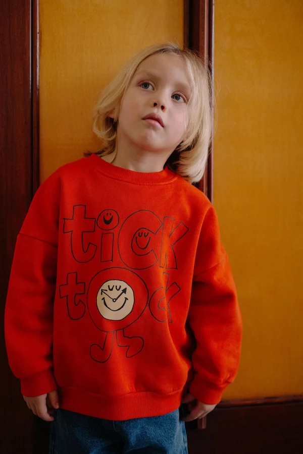 Tick Tock Playtime Sweater