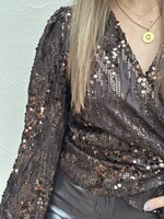 Blouse overslag pailetten