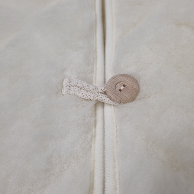 Gillet 100% wol wit met knoop