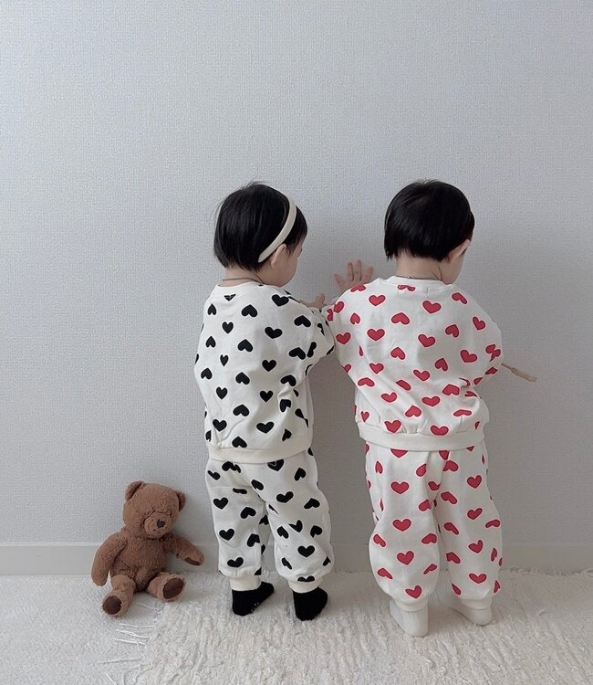 Moran Trui en broekje met zwarte hartjes