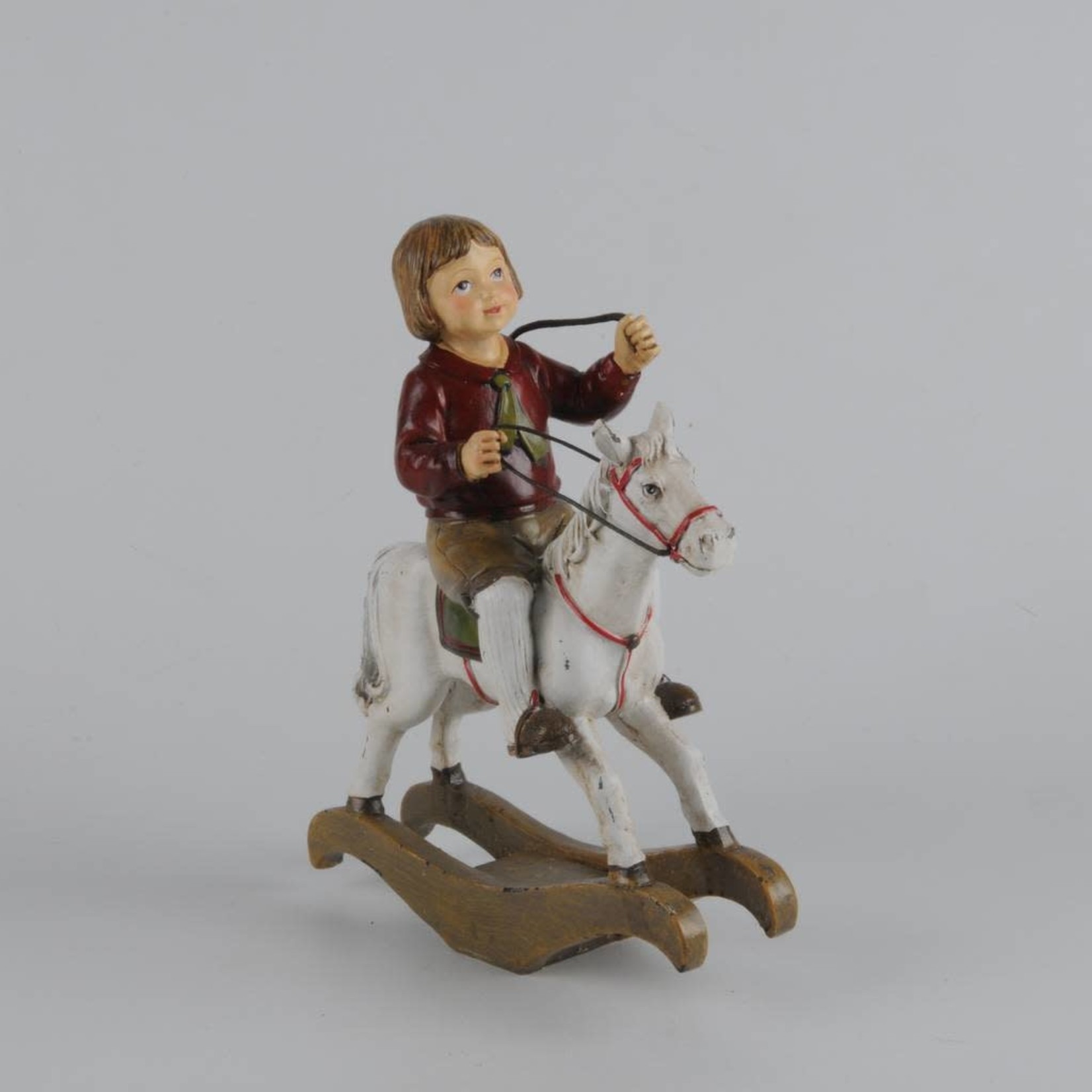 Girl On Rocking Horse