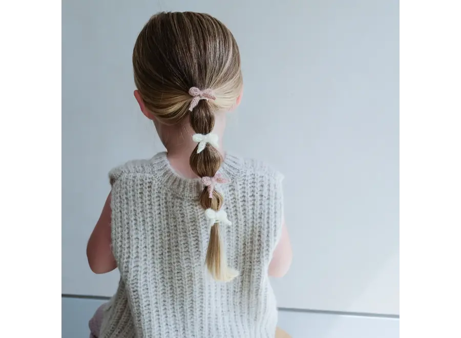 Granny knitted bow mini ponies