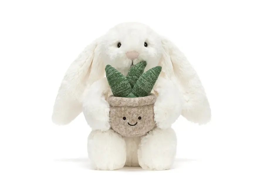 Cream bunny with plant