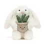 Cream bunny with plant