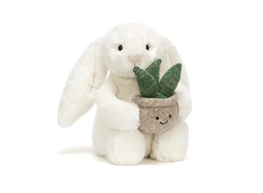 Cream bunny with plant