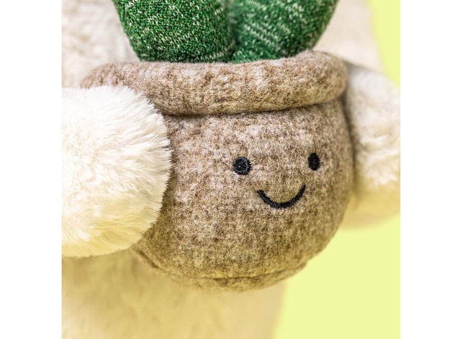 Cream bunny with plant