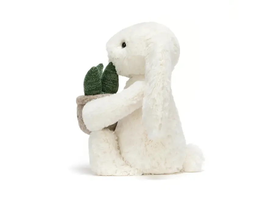 Cream bunny with plant