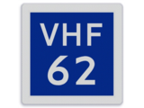 Shipping sign E.23 - VHF channel for nautical information