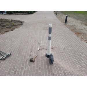 Flexible and removable barrier poles orange