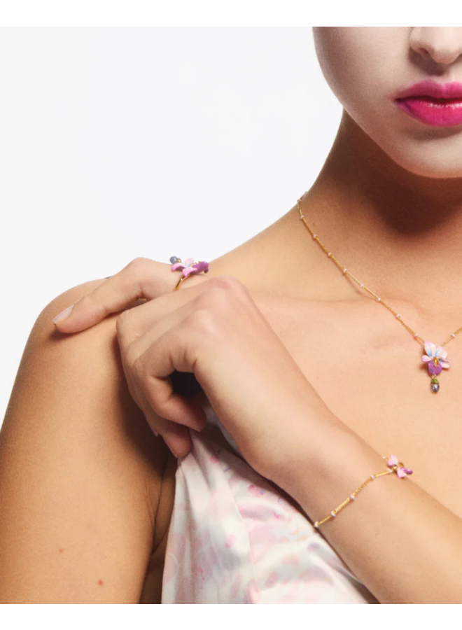 Les Néréides Adjustable ring with violet flower and blue cut stone