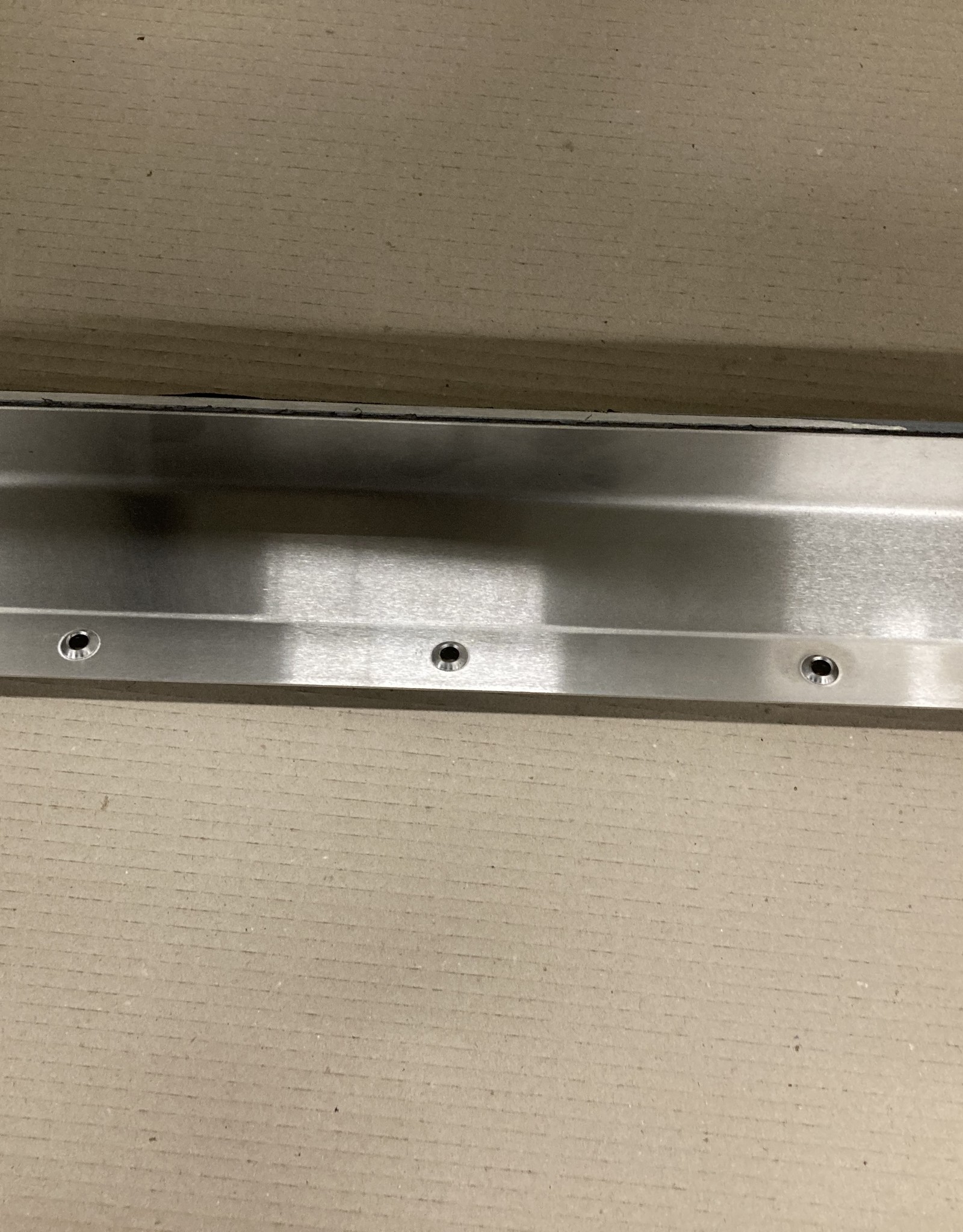 Plaque de criblage pour plaque de pression