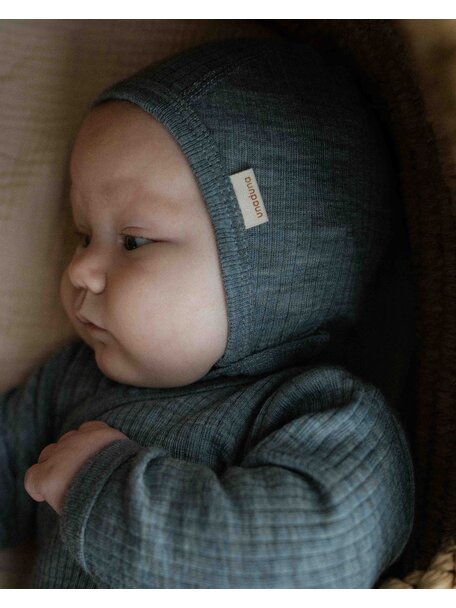 Unaduna Bonnet of wool with press stud rib  - nila