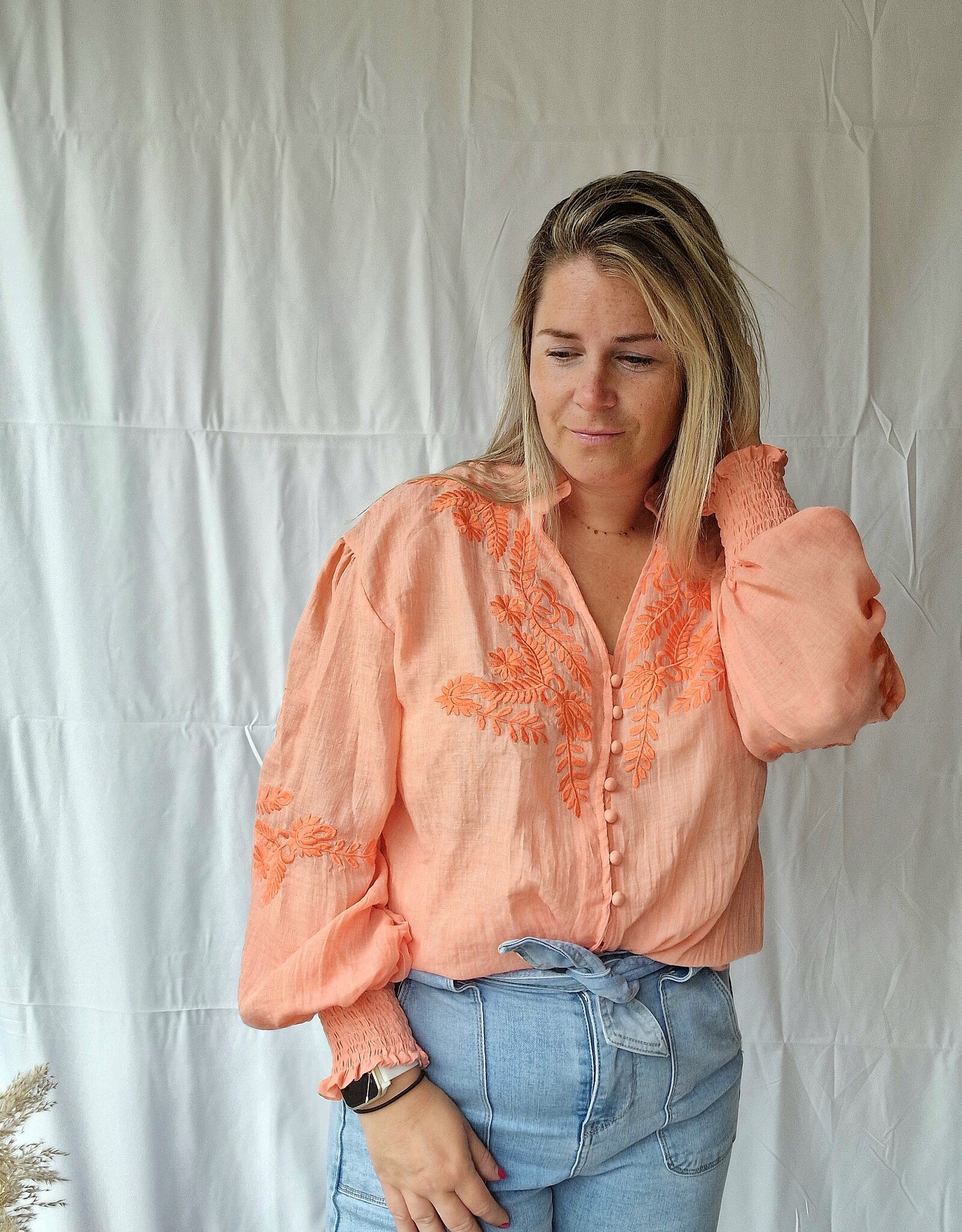 Coral blouse broderie