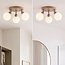 Loftlampe Zano med 3 justerbare lyskilder i sandbeige med mælkehvidt glas