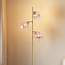 Gulvlampe Melissa med 3 lyskilder i guld med amber glas