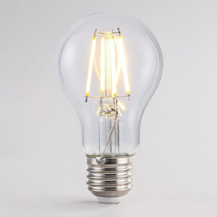 3-trins dæmpbar A60 filamentpære i transparent glas, 4,5W eller 7W, 2700K