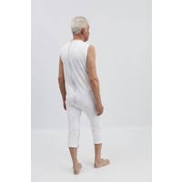 Corps blanc sans manches avec fermeture à  glissière au dos et entre les jambes