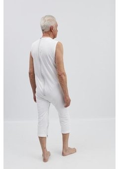 Corps blanc sans manches avec fermeture à  glissière au dos et entre les jambes