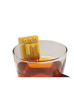 Indicateur de liquide suspendu au bord d'une tasse ou d'un verre