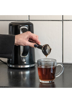 Presse à sachets de thé