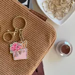 Stationery & Gift Emily in Paris - keychain tasje