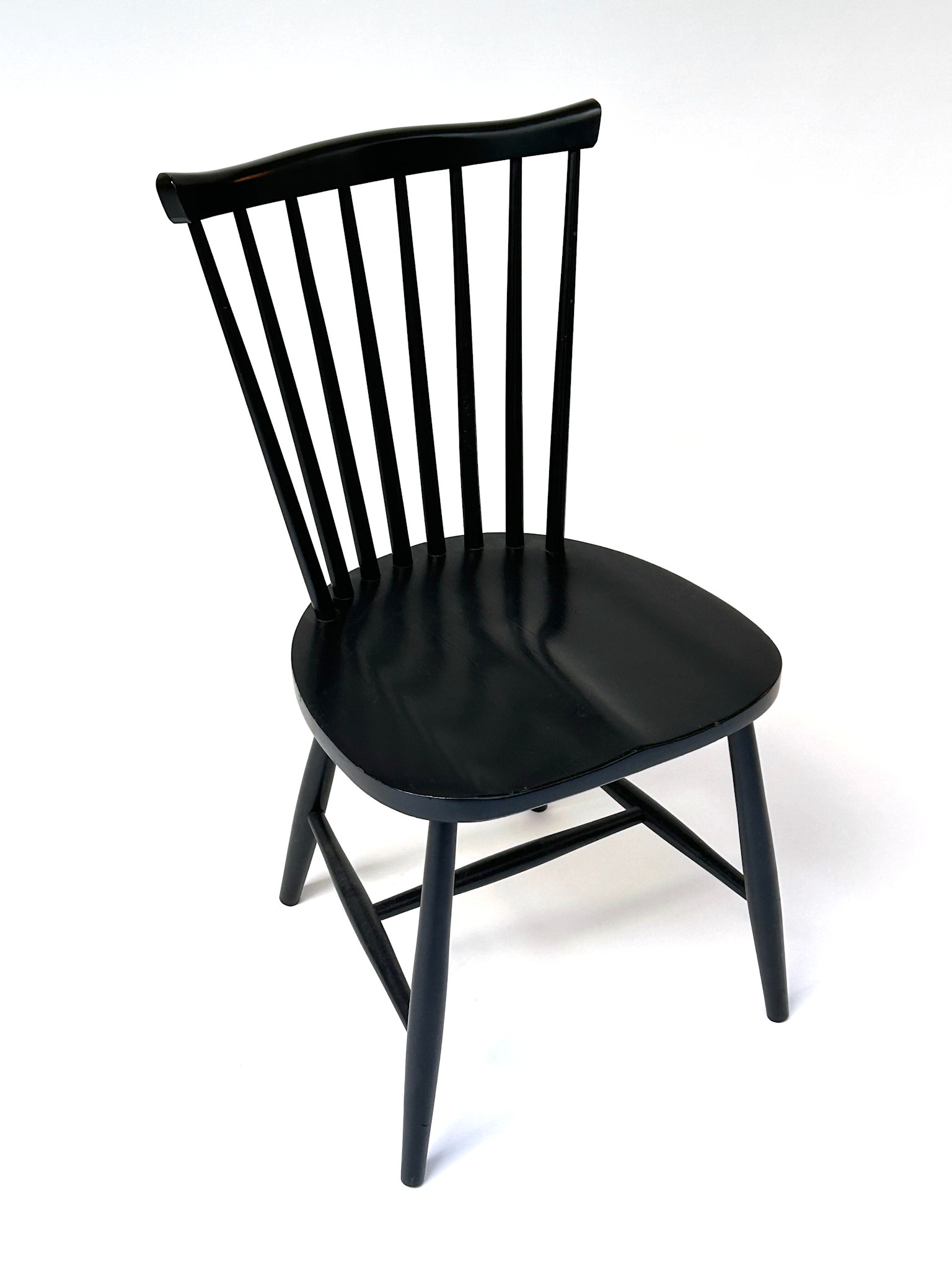 Set 4 vintage zwarte spijlenstoelen