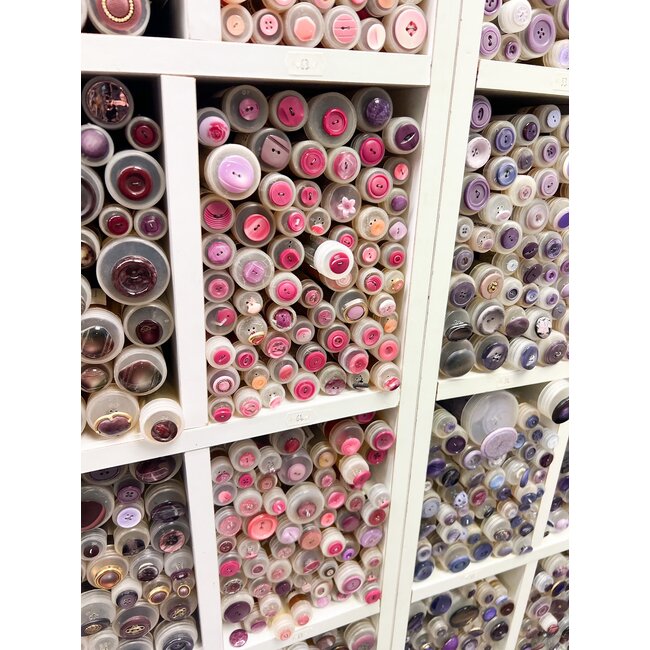 Knopen fuchsia tinten