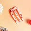 Clips Polly Pin clip - marmer oranje/wit