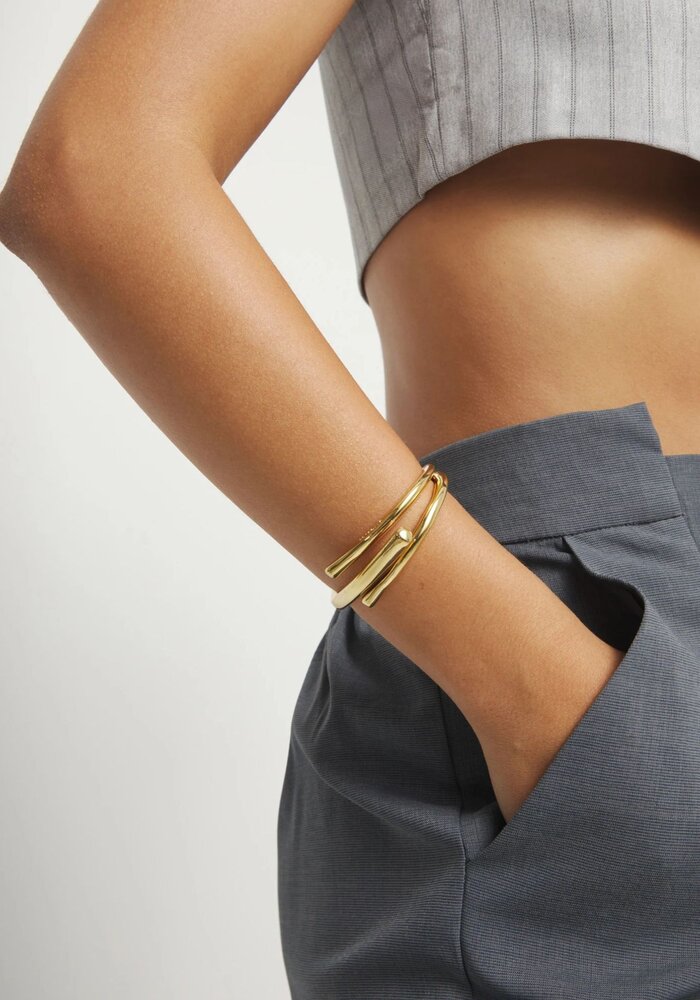 Uno de 50 Bangle Bracelet With Three Intertwined Organic Shapes PUL2631ORO