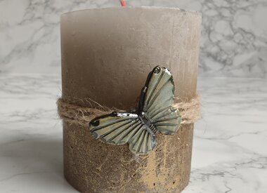 Kaars met vlinder in keramiek
