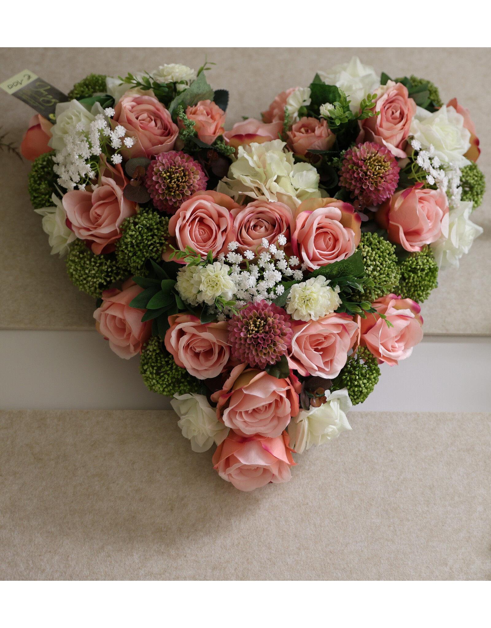 Zijden bloemstuk roze 100 euro