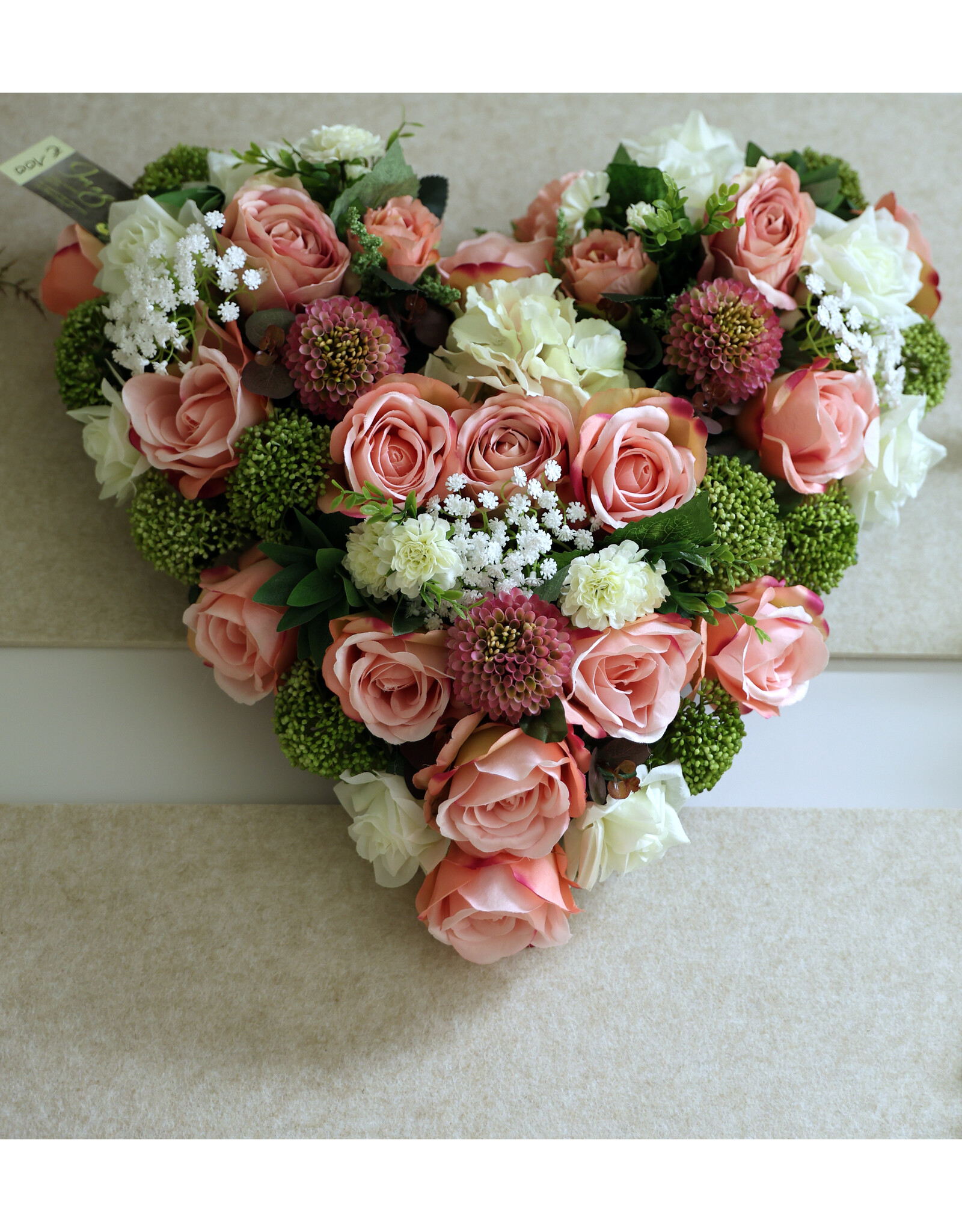 Zijden bloemstuk roze 100 euro